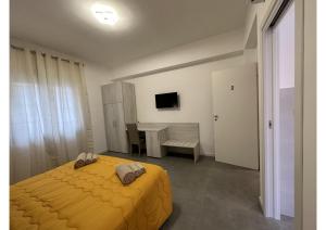 TV a/nebo společenská místnost v ubytování GIROOMS B&B