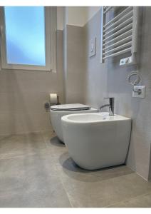 Koupelna v ubytování GIROOMS B&B
