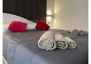 Postel nebo postele na pokoji v ubytování GIROOMS B&B