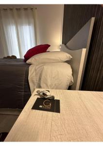 Postel nebo postele na pokoji v ubytování GIROOMS B&B