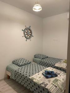Posteľ alebo postele v izbe v ubytovaní Duplex terrasse vue mer - Soleil Levant La Ciotat