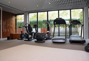 Posilňovňa alebo fitness centrum v ubytovaní Luxus Apartament Rodzinny z sauną i siłownią