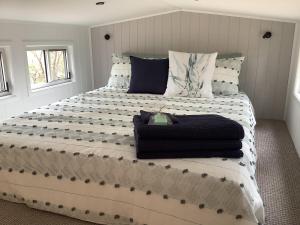 Postel nebo postele na pokoji v ubytování Eppalock Hilltop Retreat