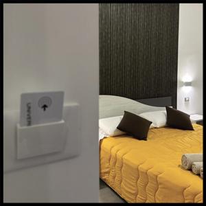 Postel nebo postele na pokoji v ubytování GIROOMS B&B