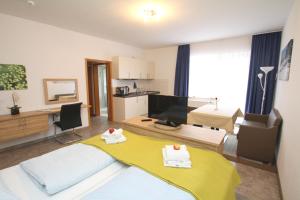 Dapur atau dapur kecil di GRÜNBLAU RELAX Pension & Apartments +32 gambar