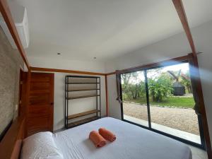 Postel nebo postele na pokoji v ubytování Pyramid Tamarindo Luxury Hotel + 37 fotografií