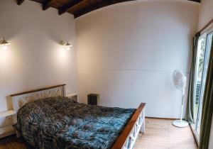 Een bed of bedden in een kamer bij Descanso en La Caleta