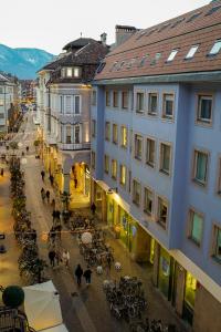 an overhead view of a street in a city with buildings at Your Stay in Bolzano in Bolzano