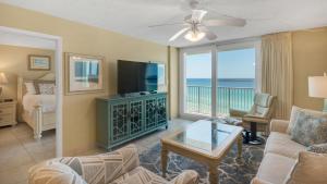 a living room with a view of the ocean at Beachcrest 903 in Santa Rosa Beach