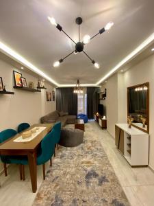Et opholdsområde på Cozy 2BR Apartment in Maadi