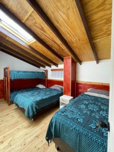 Cama o camas de una habitación en Cabañas Newen