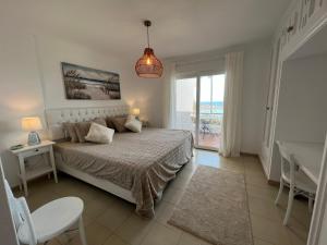Posteľ alebo postele v izbe v ubytovaní Playa Cristo Amazing Beach Terrace Appartment