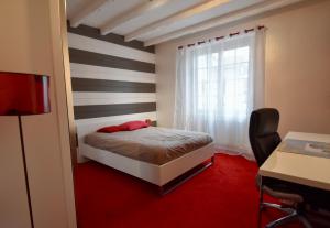 Postel nebo postele na pokoji v ubytování LES VILLAS PARADIS - Annet, proche Paris & Disneyland