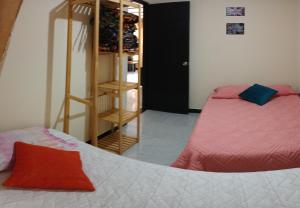 Llit o llits en una habitació de Acogedor Apartamento en Centro de Popayán