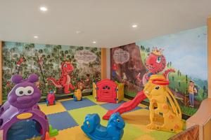 a childs room with toys and a mural at Sterling Yercaud in Yercaud +106 photos