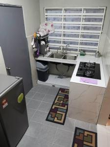 Köök või kööginurk majutusasutuses Mekar KH Homestay (Muslim) @ Brinchang