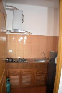 Kuchyň nebo kuchyňský kout v ubytování P and A Thai Lanna Resort