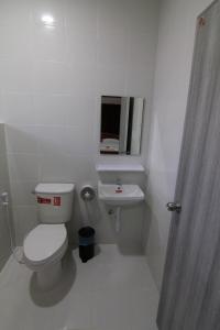 Fotografie z fotogalerie ubytování บ้านสวนมะม่วงรีสอร์ท v destinaci Ban Klang