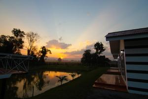 Fotografie z fotogalerie ubytování บ้านสวนมะม่วงรีสอร์ท v destinaci Ban Klang + 31 fotografií