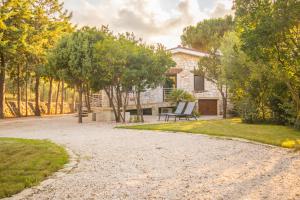 En have udenfor Ginepro Villa Capelvenere