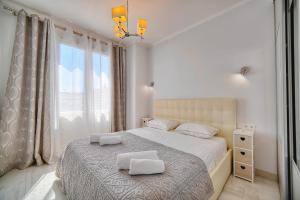 Łóżko lub łóżka w pokoju w obiekcie REF 1477 - Apartment for rent