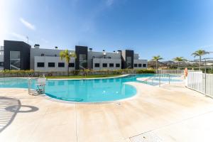 The swimming pool at or close to 208 New luxury apartment Calaserena