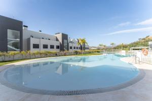 The swimming pool at or close to 208 New luxury apartment Calaserena