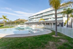 The swimming pool at or close to 208 New luxury apartment Calaserena