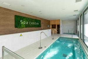 The swimming pool at or close to 208 New luxury apartment Calaserena