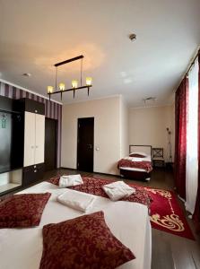 Katil atau katil-katil dalam bilik di IRIS Hotel