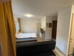 Postel nebo postele na pokoji v ubytování Joli studio au pied du Moleson