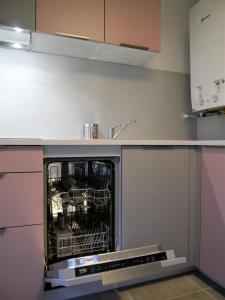 Kuchyňa alebo kuchynka v ubytovaní Appartement Le Céleste 113 - deux chambres