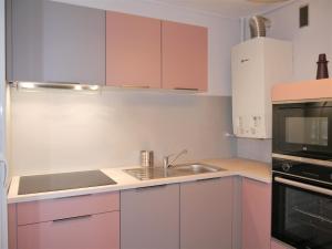 Kuchyňa alebo kuchynka v ubytovaní Appartement Le Céleste 113 - deux chambres