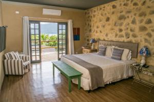 Katil atau katil-katil dalam bilik di Hotel Boutique Ananas