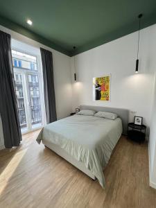 Ένα ή περισσότερα κρεβάτια σε δωμάτιο στο Plan B B&B +35 φωτογραφίες