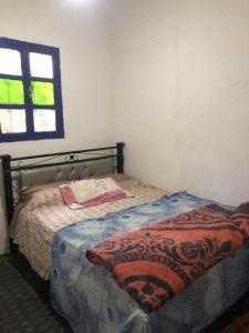 Gite La belle vue Timichi客房内的一张或多张床位