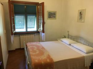 Posteľ alebo postele v izbe v ubytovaní Le Ginestre