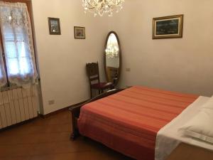 Posteľ alebo postele v izbe v ubytovaní Le Ginestre
