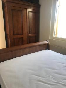 Een bed of bedden in een kamer bij Logement : 2 chambres (5 couchages), salle de bain