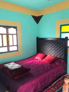 Gite La belle vue Timichi客房内的一张或多张床位