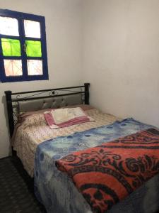 Gite La belle vue Timichi客房内的一张或多张床位