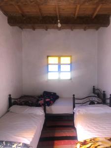 Gite La belle vue Timichi客房内的一张或多张床位