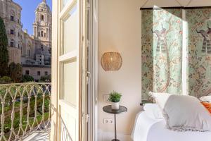Posteľ alebo postele v izbe v ubytovaní Genteel Home San Agustín