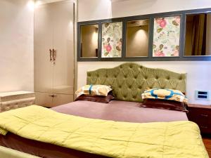 Ліжко або ліжка в номері Olive luxury apartment
