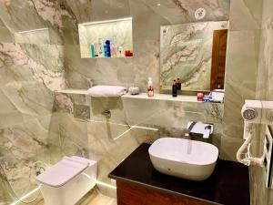 Ванна кімната в Olive luxury apartment