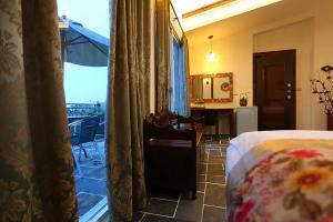 Postel nebo postele na pokoji v ubytování Cloudenjoy B&B
