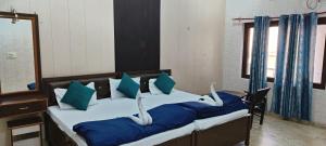 Voodi või voodid majutusasutuse BlueStays Hostel toas +17 fotot