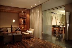 a living room with a couch and a table at Hyatt Regency Birmingham in Birmingham
