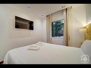A bed or beds in a room at MONTLUDE de Alma de Nieve