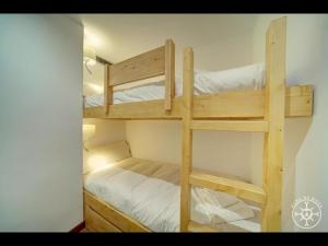 A bed or beds in a room at MONTLUDE de Alma de Nieve
